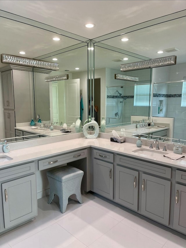 10876 SW Sunray St, Port Saint Lucie, FL 34987 - full bathroom with a shower stall, tile patterned flooring, vanity, and recessed lighting