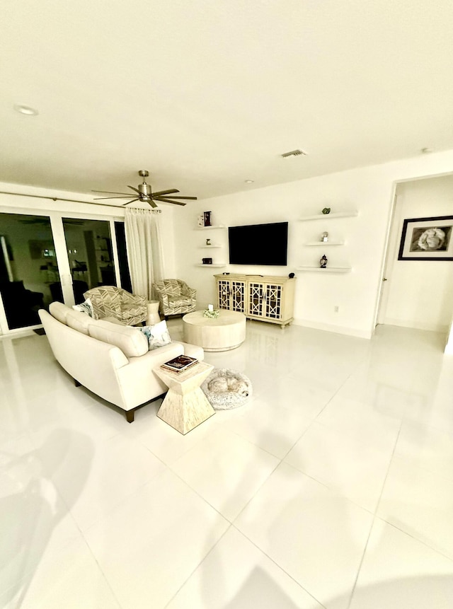 10876 SW Sunray St, Port Saint Lucie, FL 34987 - living area featuring tile patterned floors and ceiling fan