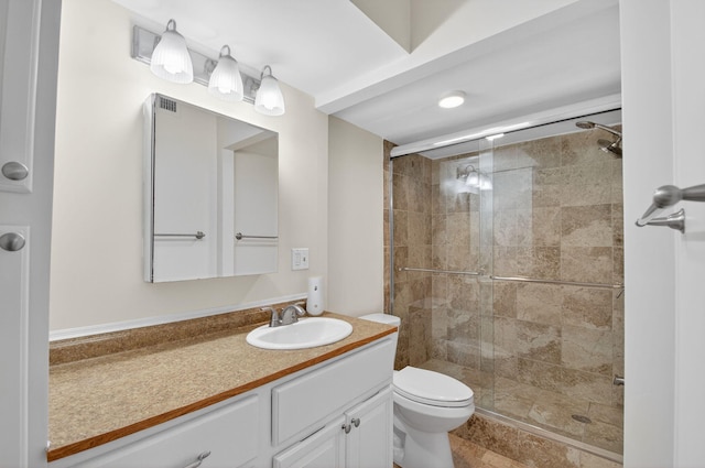 3540 S Ocean Blvd Unit 610, South Palm Beach, FL 33480 - bathroom featuring a stall shower, vanity, and toilet