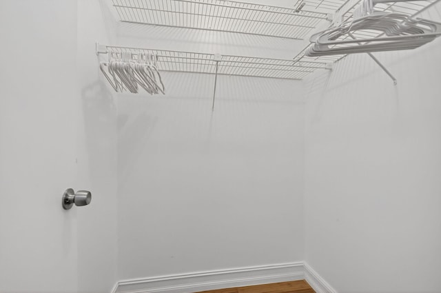3540 S Ocean Blvd Unit 610, South Palm Beach, FL 33480 - spacious closet featuring wood finished floors