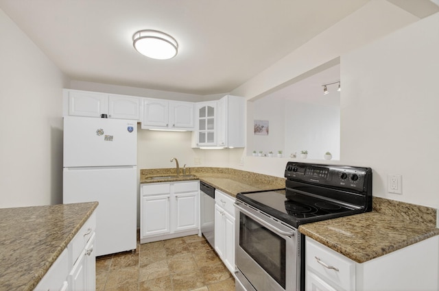 3540 S Ocean Blvd Unit 610, South Palm Beach, FL 33480 - kitchen with appliances with stainless steel finishes, a sink, glass insert cabinets, and white cabinetry
