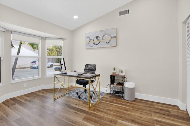 11080 Lakeaire Cir, Boca Raton, FL 33498 - office featuring vaulted ceiling, wood finished floors, baseboards, and recessed lighting