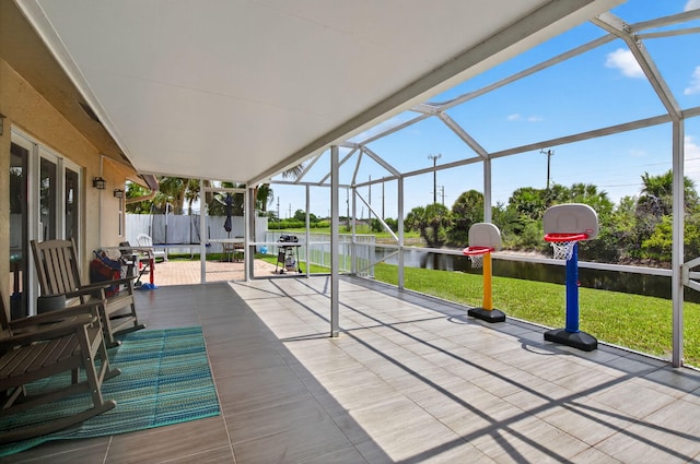 11080 Lakeaire Cir, Boca Raton, FL 33498 - wooden deck featuring a water view, a patio area, and glass enclosure