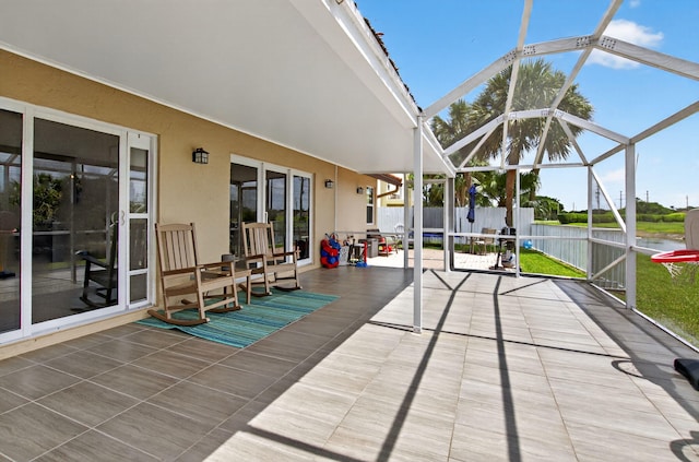 11080 Lakeaire Cir, Boca Raton, FL 33498 - sunroom with a water view