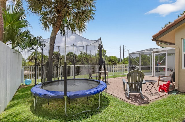 11080 Lakeaire Cir, Boca Raton, FL 33498 - view of yard with a trampoline and a patio area