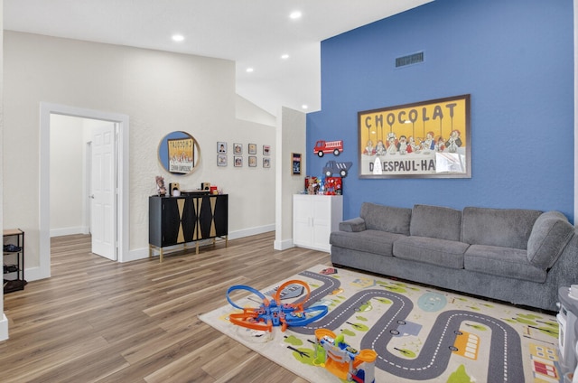 11080 Lakeaire Cir, Boca Raton, FL 33498 - living room with wood finished floors, high vaulted ceiling, baseboards, and recessed lighting