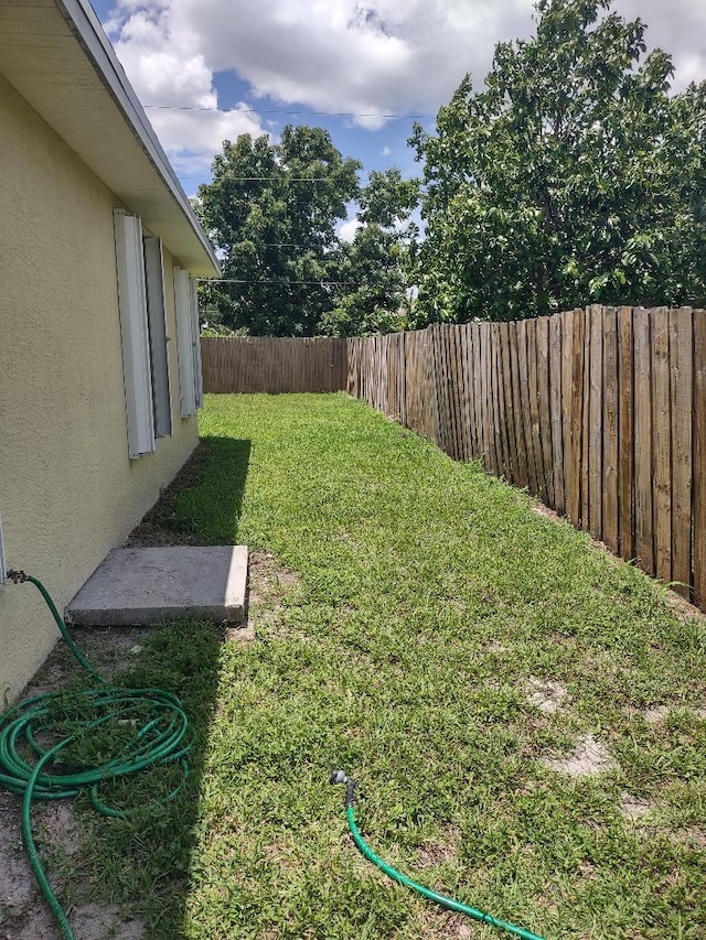 1032 SW Castaneda Ln SW, Port Saint Lucie, FL 34953 - view of fenced backyard