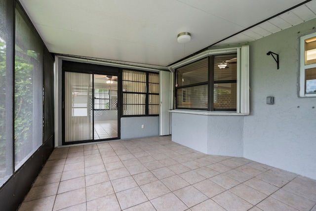 2455 SW Datura Ave, Port Saint Lucie, FL 34953 - unfurnished sunroom featuring a ceiling fan