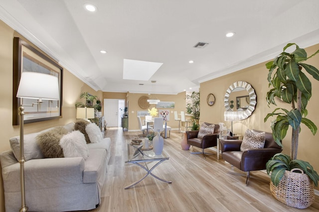 12562 Crystal Pointe Dr Unit B, Boynton Beach, FL 33437 - living area with a skylight, light wood finished floors, recessed lighting, and baseboards