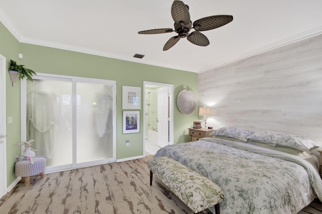 12562 Crystal Pointe Dr Unit B, Boynton Beach, FL 33437 - bedroom featuring crown molding, wood finished floors, baseboards, a ceiling fan, and connected bathroom