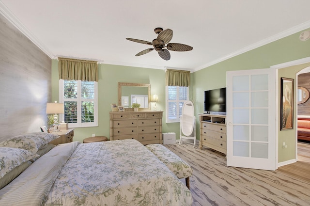 12562 Crystal Pointe Dr Unit B, Boynton Beach, FL 33437 - bedroom featuring ornamental molding, wood finished floors, baseboards, and ceiling fan