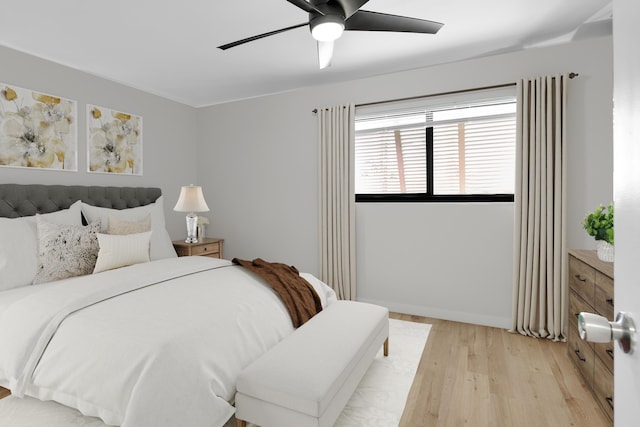 121 W Arch Dr (), Unit Lake Worth, FL 33467 - bedroom featuring light wood-type flooring, a ceiling fan, and baseboards