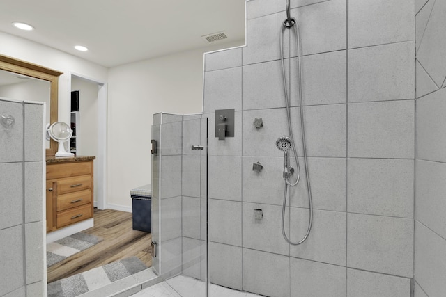 121 W Arch Dr (), Unit Lake Worth, FL 33467 - full bath with tiled shower, wood finished floors, recessed lighting, vanity, and baseboards