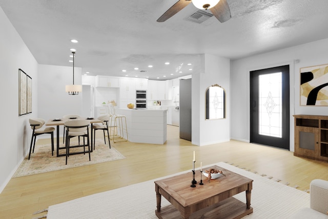 121 W Arch Dr (), Unit Lake Worth, FL 33467 - living room featuring light wood-style floors, ceiling fan, recessed lighting, and baseboards