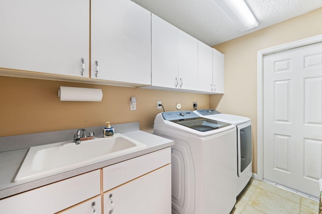 13277 Opal Ln, Wellington, FL 33414 - laundry room with separate washer and dryer, cabinet space, and light tile patterned floors