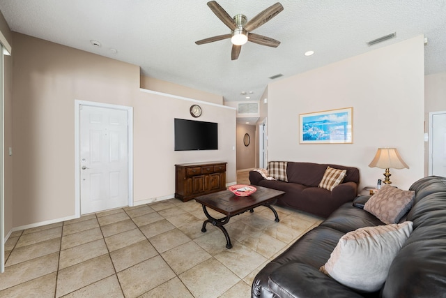 13277 Opal Ln, Wellington, FL 33414 - living area with ceiling fan, a textured ceiling, light tile patterned floors, and recessed lighting