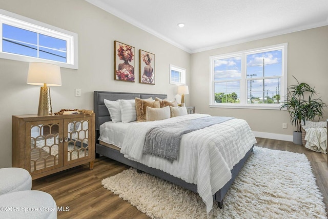 840 Florida Ave Unit 5, Cocoa, FL 32922 - bedroom featuring ornamental molding, dark wood finished floors, baseboards, and recessed lighting
