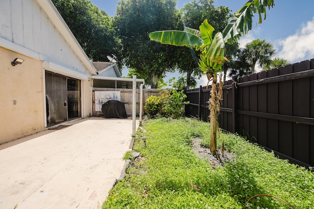 5402 Bonky Ct Unit 102B, West Palm Beach, FL 33415 - view of yard with a patio area