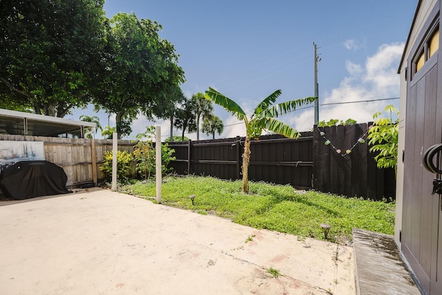5402 Bonky Ct Unit 102B, West Palm Beach, FL 33415 - fenced backyard featuring a patio area