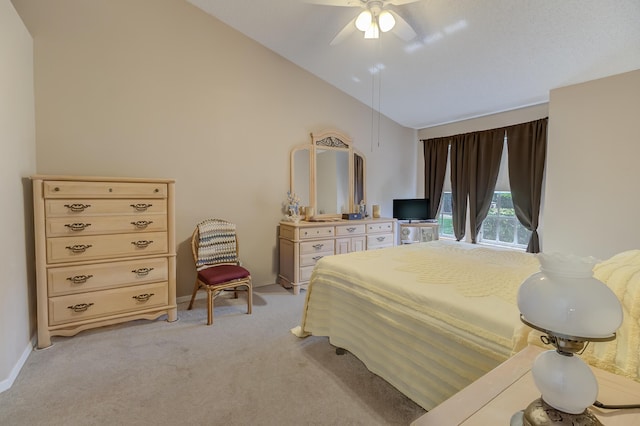3892 SW Jablo St, Port Saint Lucie, FL 34953 - bedroom featuring light colored carpet, ceiling fan, high vaulted ceiling, and baseboards