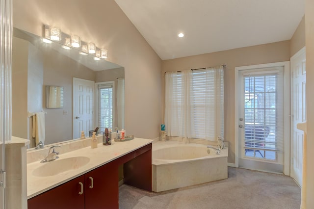 3892 SW Jablo St, Port Saint Lucie, FL 34953 - full bath with vanity, lofted ceiling, a garden tub, and recessed lighting