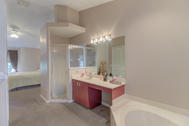 3892 SW Jablo St, Port Saint Lucie, FL 34953 - full bathroom with connected bathroom, a stall shower, a bath, and vanity