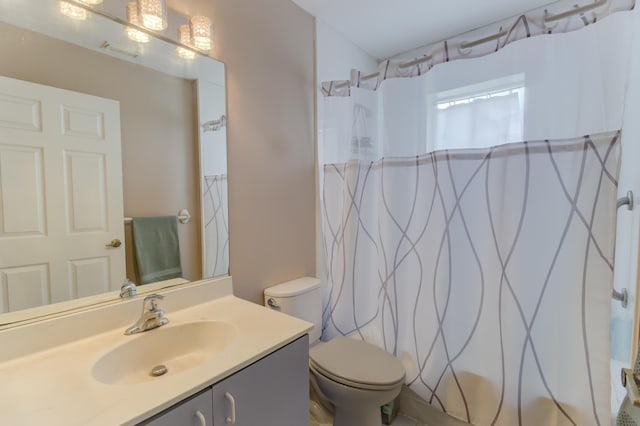 3892 SW Jablo St, Port Saint Lucie, FL 34953 - bathroom featuring vanity, toilet, and a shower with curtain