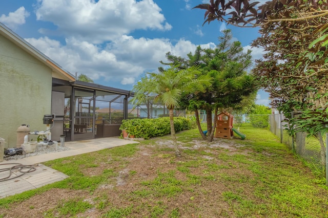 3892 SW Jablo St, Port Saint Lucie, FL 34953 - view of yard with a sunroom