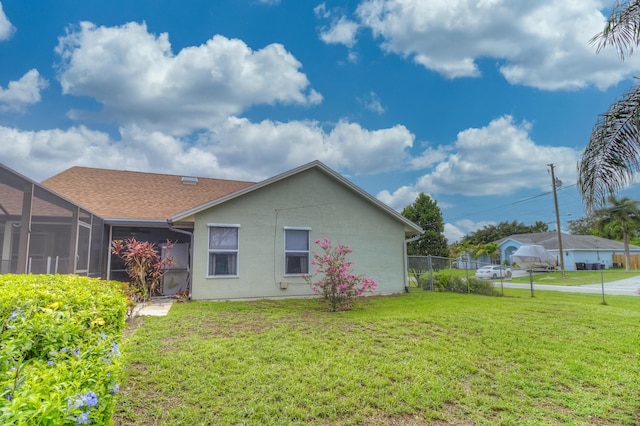 3892 SW Jablo St, Port Saint Lucie, FL 34953 - rear view of property featuring stucco siding