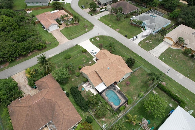 3892 SW Jablo St, Port Saint Lucie, FL 34953 - aerial view of property's location featuring nearby suburban area and a pool area