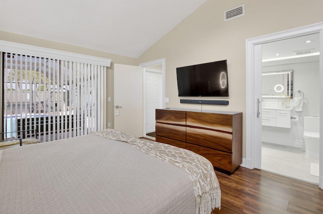 9844 Boca Gardens Cir N Unit D, Boca Raton, FL 33496 - bedroom with lofted ceiling, wood finished floors, ensuite bath, and baseboards