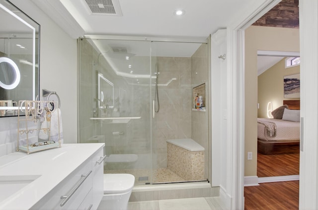 9844 Boca Gardens Cir N Unit D, Boca Raton, FL 33496 - ensuite bathroom featuring vanity, a stall shower, toilet, wood finished floors, and recessed lighting