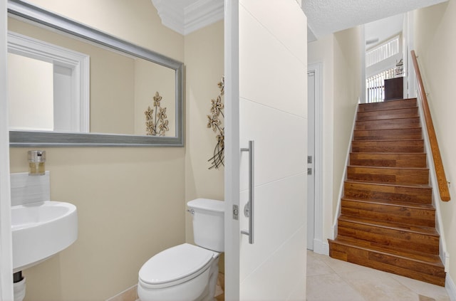 9844 Boca Gardens Cir N Unit D, Boca Raton, FL 33496 - bathroom with toilet and tile patterned flooring