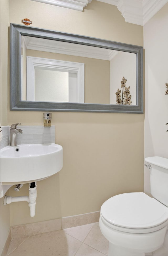 9844 Boca Gardens Cir N Unit D, Boca Raton, FL 33496 - bathroom with toilet, crown molding, tile patterned floors, and baseboards
