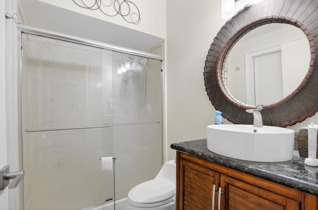 9844 Boca Gardens Cir N Unit D, Boca Raton, FL 33496 - full bathroom with vanity, a shower stall, and toilet