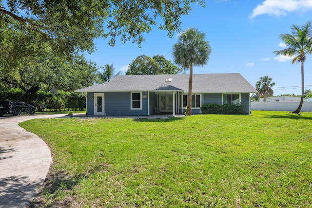 11038 Monet Ln, Palm Beach Gardens, FL 33410 - ranch-style house with french doors and roof with shingles
