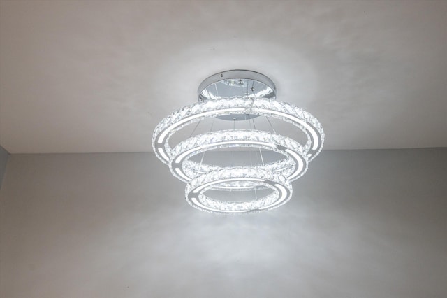 11038 Monet Ln, Palm Beach Gardens, FL 33410 - detailed view of a chandelier