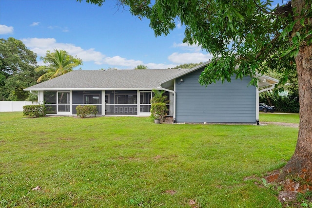11038 Monet Ln, Palm Beach Gardens, FL 33410 - rear view of property featuring a sunroom and a shingled roof