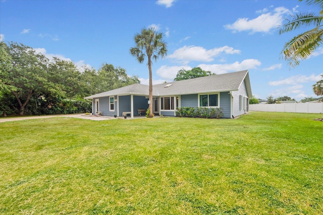 11038 Monet Ln, Palm Beach Gardens, FL 33410 - view of front of home with a patio area
