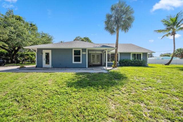 11038 Monet Ln, Palm Beach Gardens, FL 33410 - ranch-style home with french doors
