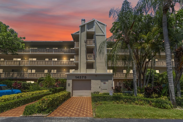 14375 Strathmore Ln Unit 306, Delray Beach, FL 33446 - view of property featuring an attached garage