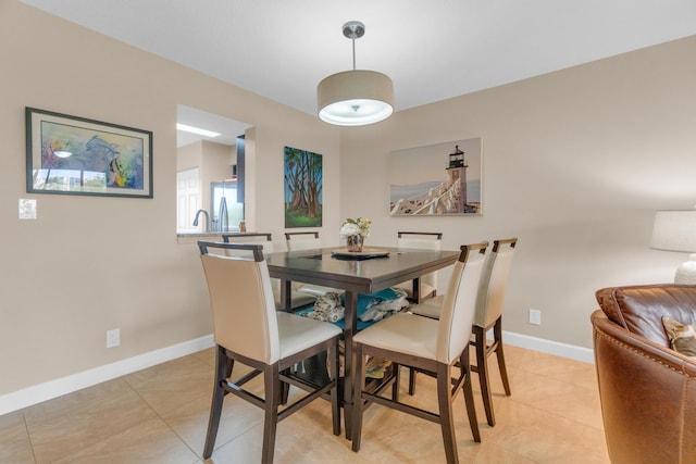 14375 Strathmore Ln Unit 306, Delray Beach, FL 33446 - dining room featuring light tile patterned floors and baseboards