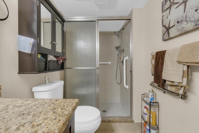 14375 Strathmore Ln Unit 306, Delray Beach, FL 33446 - bathroom with a shower stall, vanity, and tile patterned flooring
