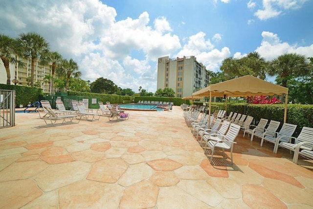 14375 Strathmore Ln Unit 306, Delray Beach, FL 33446 - community pool with a patio area