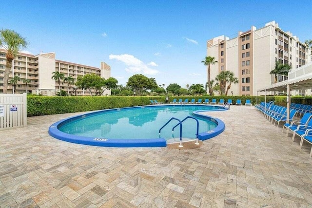 14375 Strathmore Ln Unit 306, Delray Beach, FL 33446 - community pool featuring a patio area