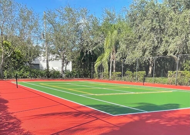 261 SW Palm Dr Unit 205, Port Saint Lucie, FL 34986 - view of tennis court with community basketball court