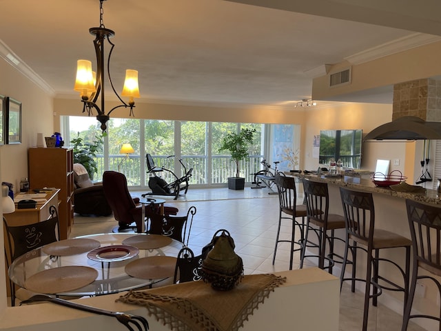 300 E Royal Palm Rd Unit 42B, Boca Raton, FL 33432 - dining area featuring light tile patterned floors and crown molding