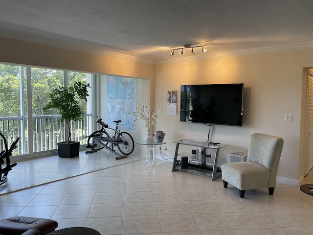 300 E Royal Palm Rd Unit 42B, Boca Raton, FL 33432 - living area featuring light tile patterned floors, healthy amount of natural light, ornamental molding, and track lighting
