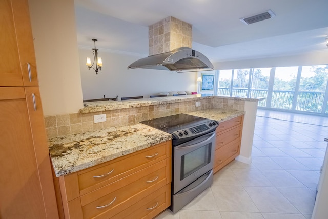 300 E Royal Palm Rd Unit 42B, Boca Raton, FL 33432 - kitchen featuring stainless steel range with electric cooktop, island exhaust hood, light tile patterned floors, light stone countertops, and a chandelier