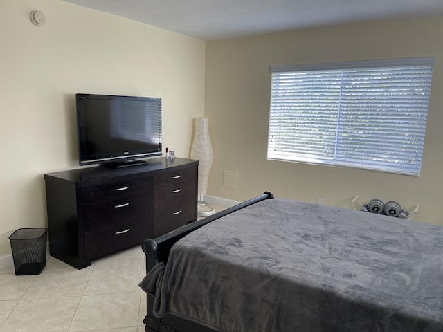 300 E Royal Palm Rd Unit 42B, Boca Raton, FL 33432 - bedroom featuring light tile patterned floors and baseboards